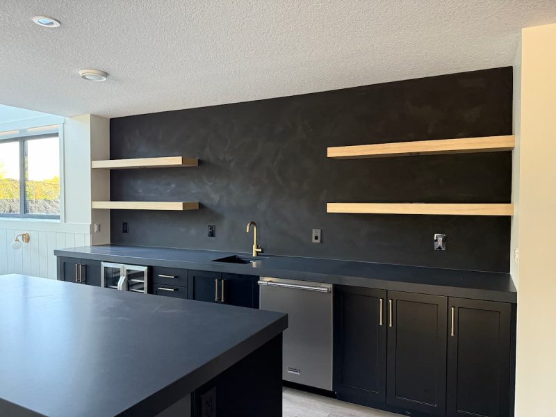 Basement bar with custom cabinets in a Sherwood Park home