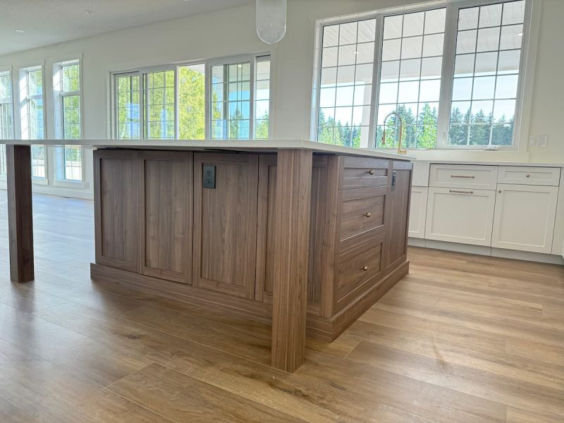 Two-tone kitchen with a wood-grain island and hidden under-island storage in Ardrossan